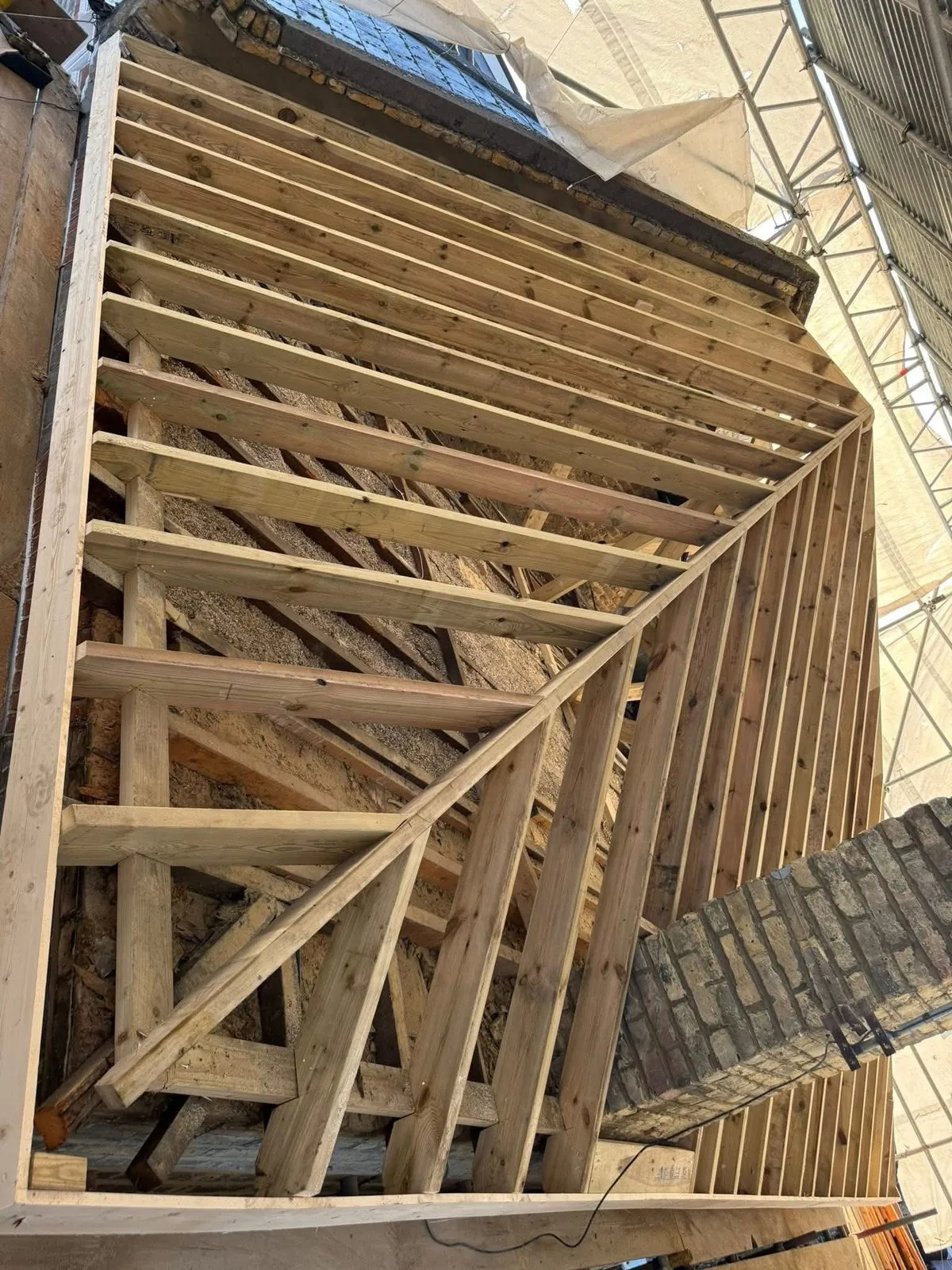 New roof timbers and rafters during a re-roof in Great Torrington